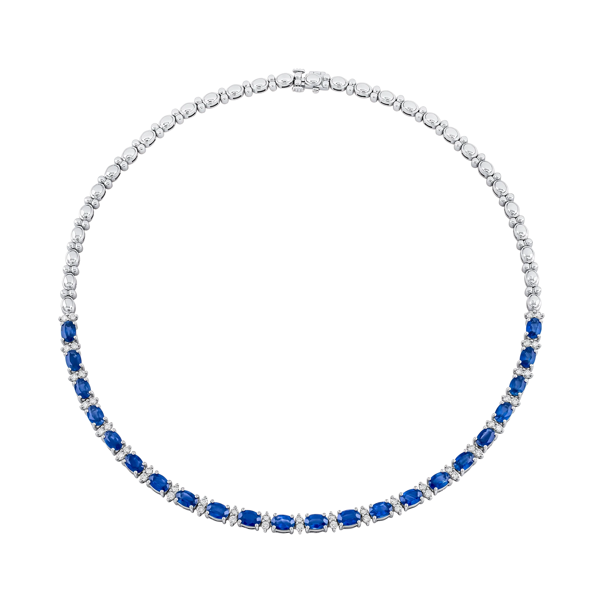 Collar en oro blanco tipo riviera con zafiros azules ovalados y diamantes.