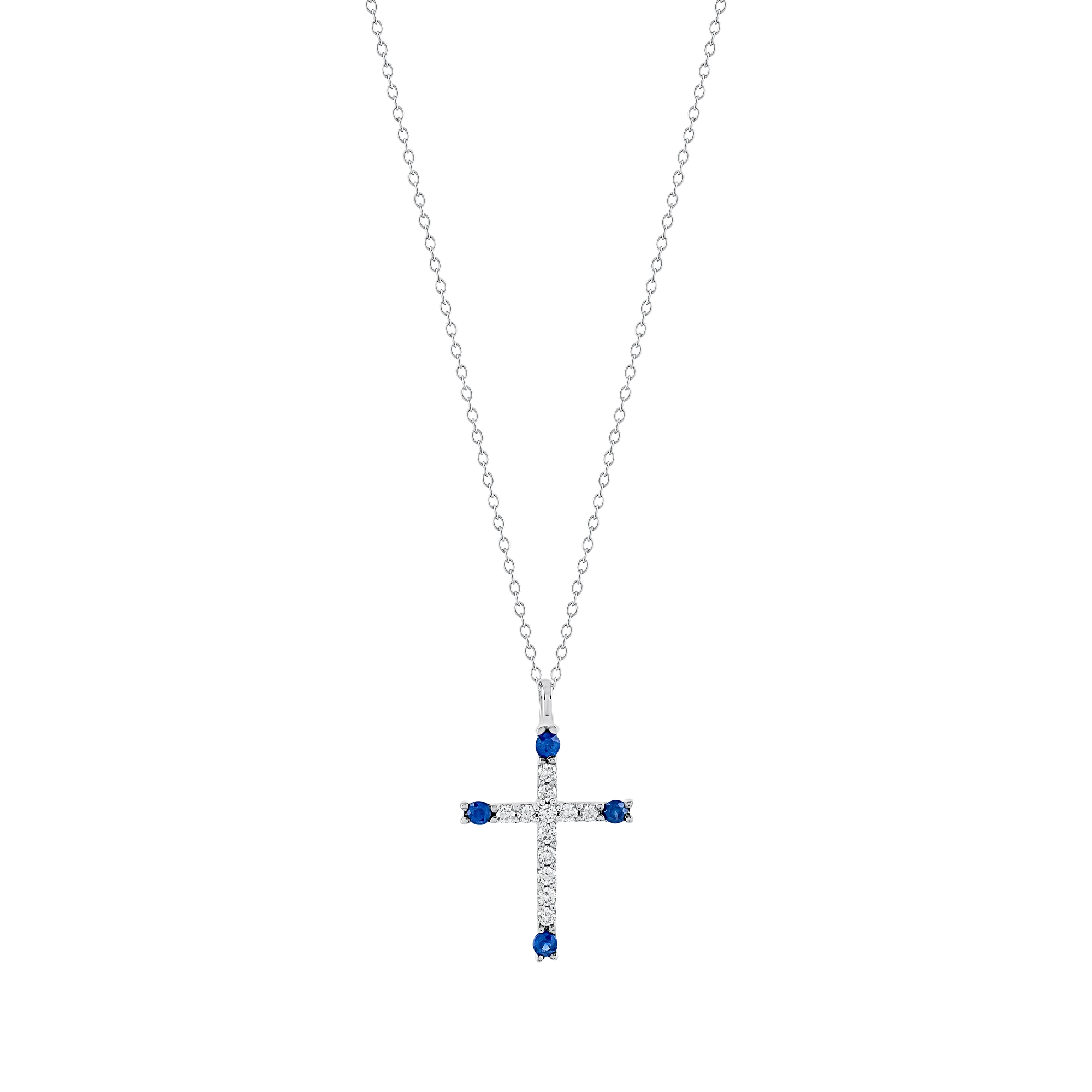Collar de cruz en oro blanco con diamantes y zafiros azules.